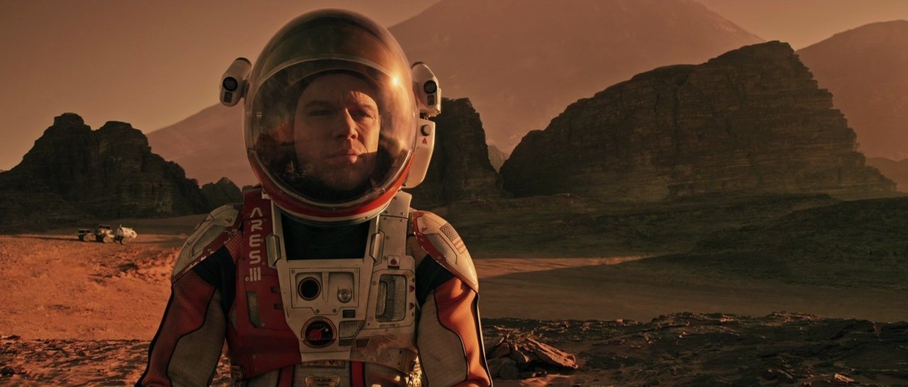 The Martian (2015) – astronaut character on the barren red Wadi Rum desert landscape used as a Mars filming location