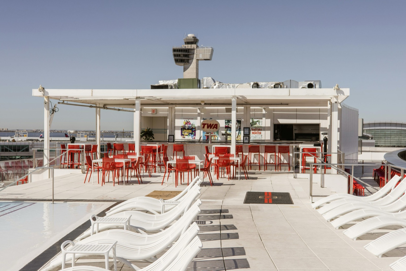 outdoor rooftop bar and pool lounge area in New York City
